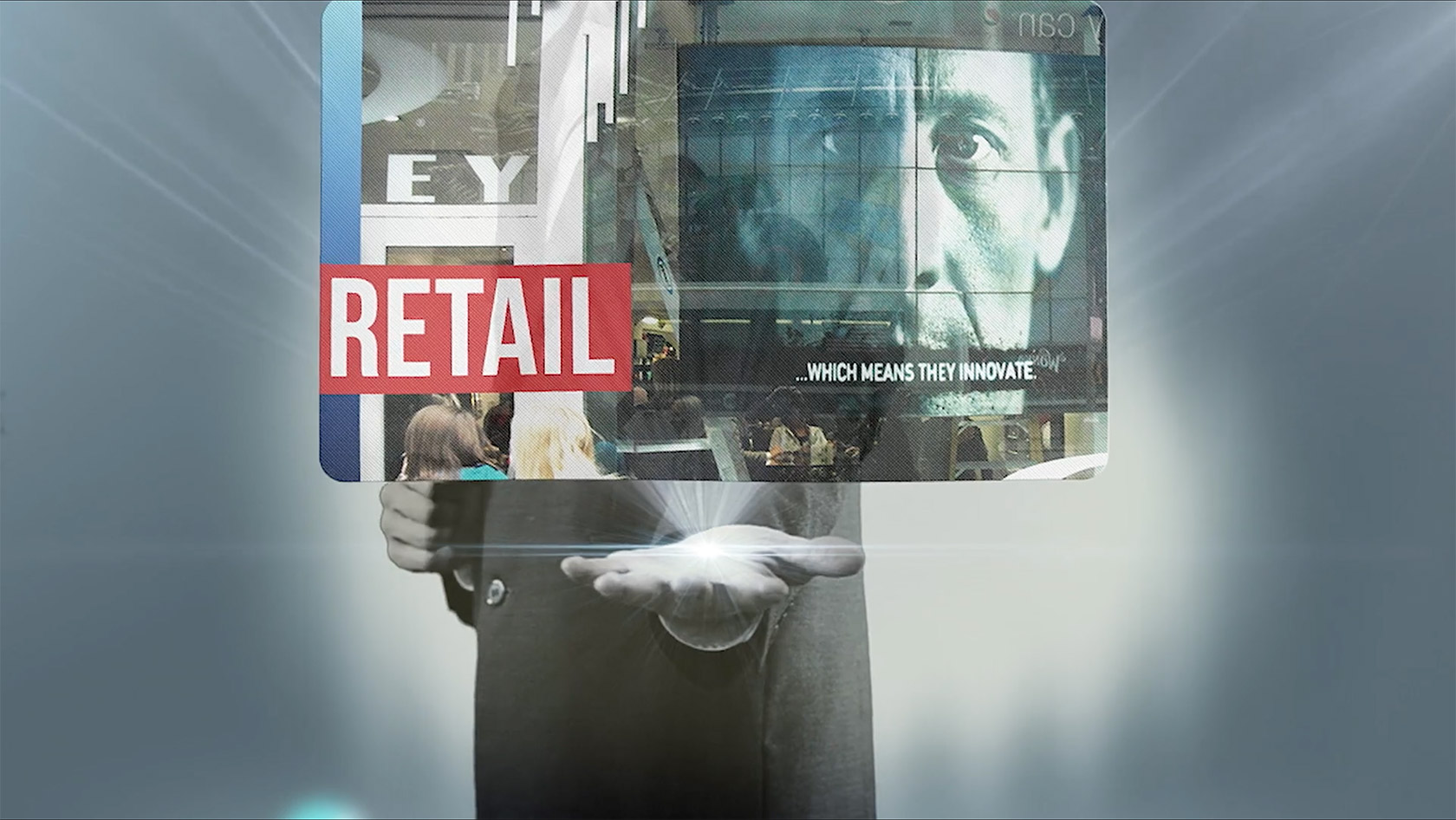 A person with a projected image coming from his hand.